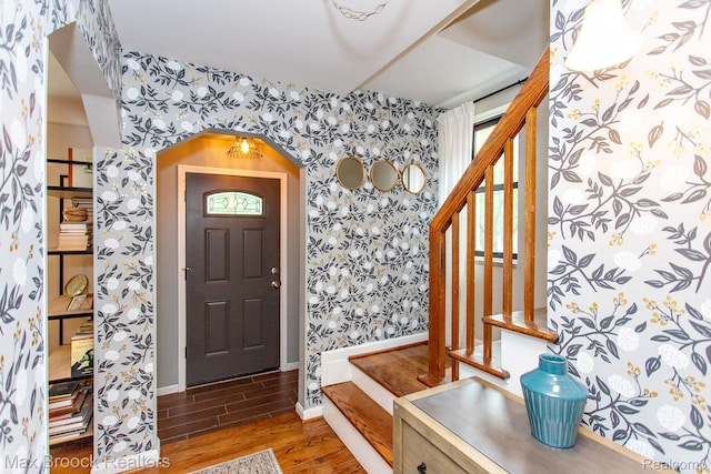 13317 Victoria Ave, Huntington Woods, MI 48070 - foyer entrance featuring wallpapered walls, wood finished floors, stairway, and baseboards