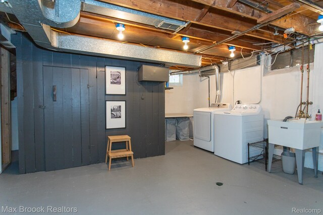 13317 Victoria Ave, Huntington Woods, MI 48070 - basement featuring washer and dryer and a sink