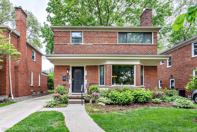 13317 Victoria Ave, Huntington Woods, MI 48070 - view of front of house featuring brick siding, a front yard, and a chimney