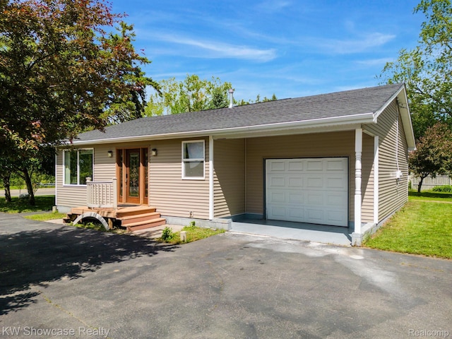 7969 Richardson Rd, West Bloomfield, MI 48323 - ranch-style home featuring an attached garage and driveway