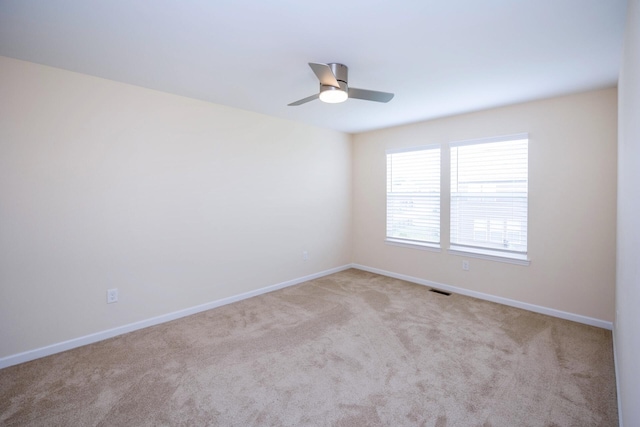 4301 Rolling Meadow Ln, Ypsilanti, MI 48197 - spare room with carpet, baseboards, and ceiling fan