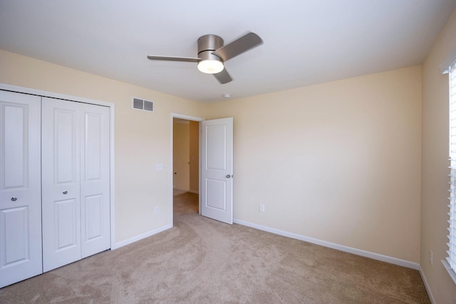 4301 Rolling Meadow Ln, Ypsilanti, MI 48197 - unfurnished bedroom featuring carpet flooring, a closet, baseboards, and ceiling fan