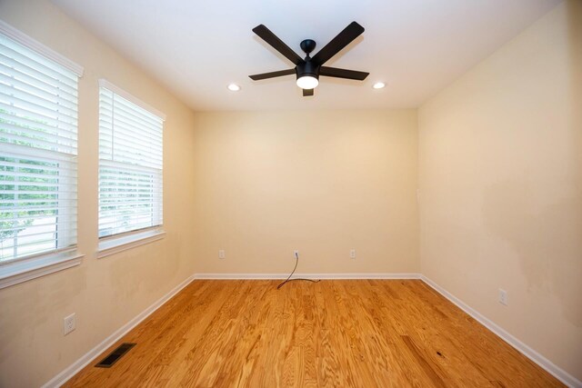 4301 Rolling Meadow Ln, Ypsilanti, MI 48197 - spare room with a ceiling fan, light wood-style flooring, recessed lighting, and baseboards