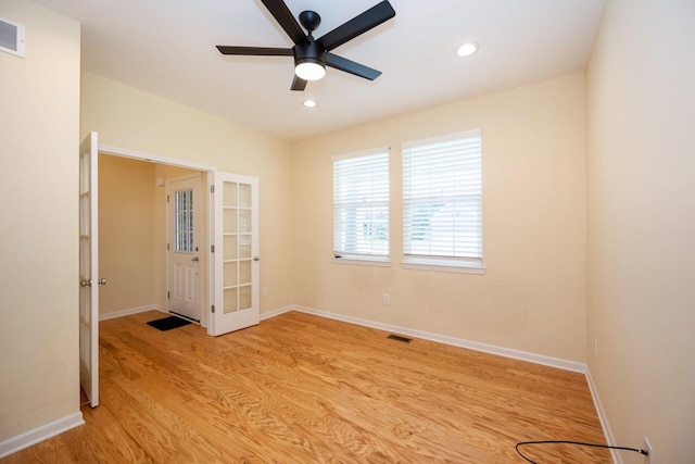 4301 Rolling Meadow Ln, Ypsilanti, MI 48197 - empty room with french doors, light wood-type flooring, a ceiling fan, recessed lighting, and baseboards