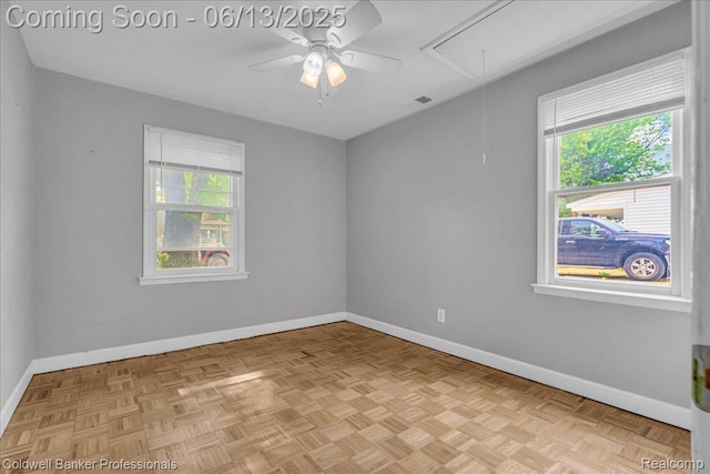 9060 N Sheldon Rd, Plymouth, MI 48170 - empty room featuring attic access, healthy amount of natural light, and a ceiling fan