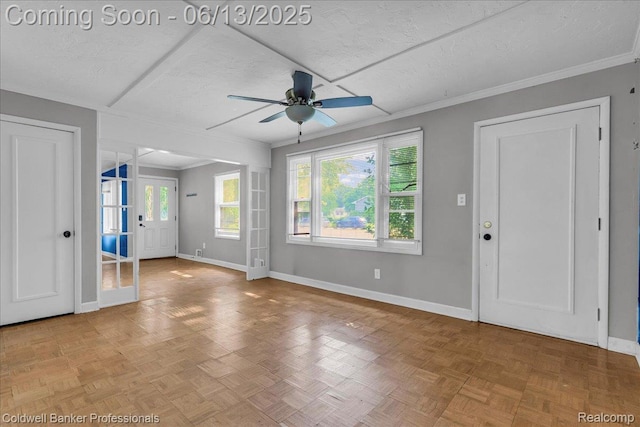 9060 N Sheldon Rd, Plymouth, MI 48170 - unfurnished living room with a ceiling fan, a textured ceiling, and crown molding