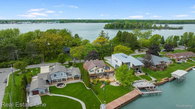 28395 Swan Island Dr, Grosse Ile, MI 48138 - aerial perspective of suburban area featuring a nearby body of water