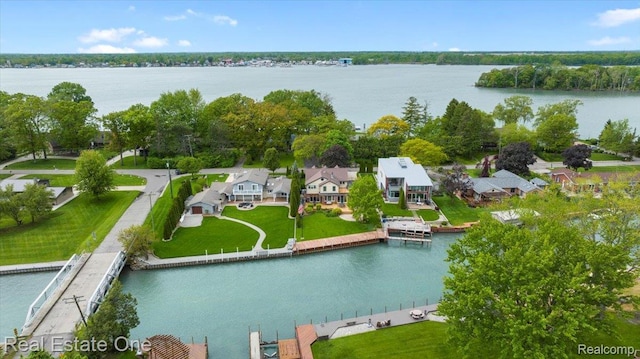 28395 Swan Island Dr, Grosse Ile, MI 48138 - aerial perspective of suburban area with a large body of water