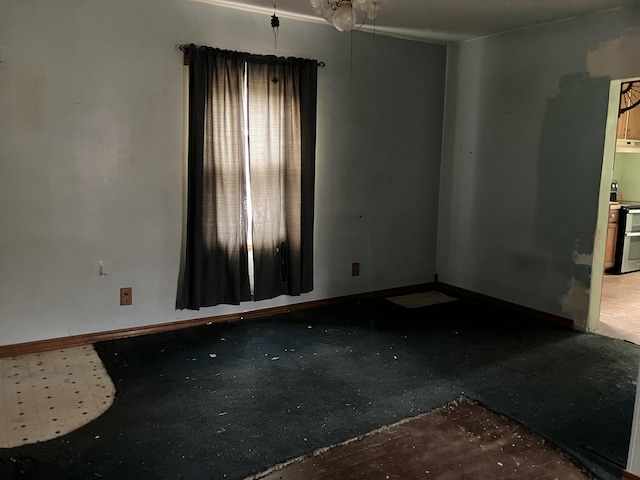 821 Fletcher St, Owosso, MI 48867 - empty room featuring baseboards