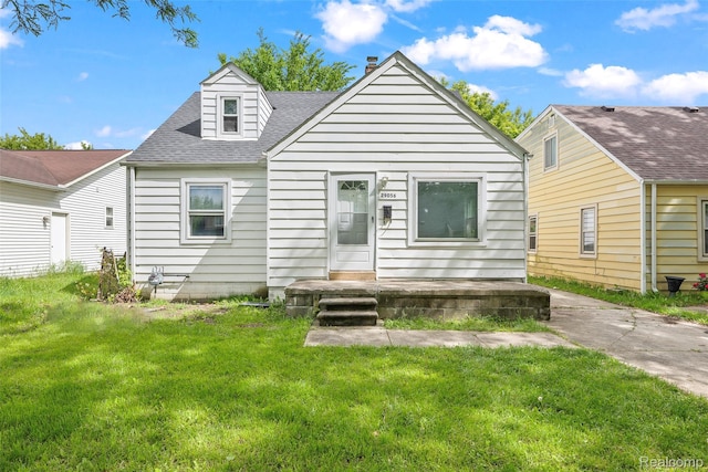 29056 Powers St, Westland, MI 48186 - view of front of property with a front lawn and a shingled roof