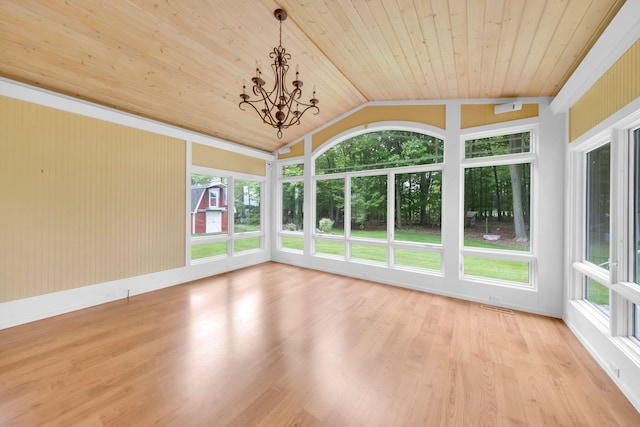 8750 20th Ave, Remus, MI 49340 - unfurnished sunroom featuring wooden ceiling, plenty of natural light, wood finished floors, vaulted ceiling, and a chandelier