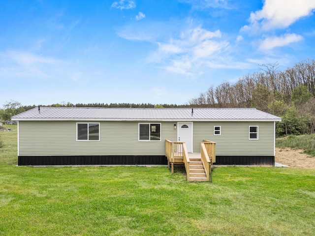 4565 155th Ave, Hersey, MI 49639 - view of front of home featuring a front yard and metal roof