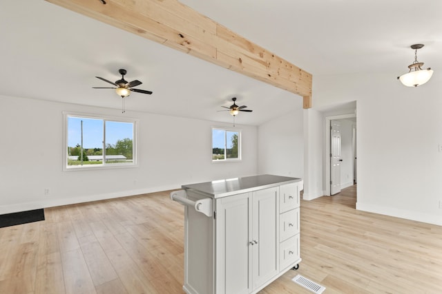 4565 155th Ave, Hersey, MI 49639 - kitchen featuring open floor plan, a ceiling fan, light wood-style flooring, baseboards, and beam ceiling