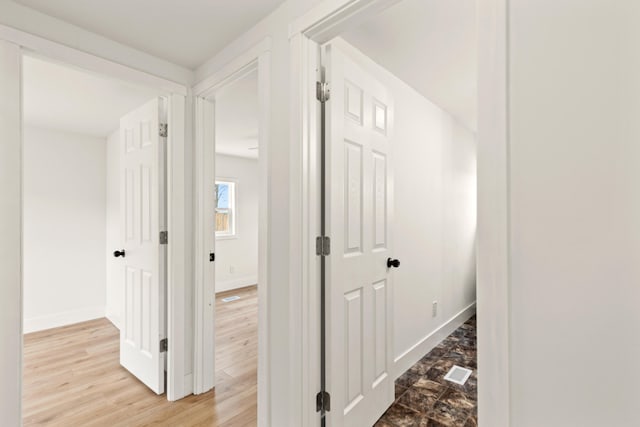 4565 155th Ave, Hersey, MI 49639 - corridor featuring baseboards and light wood-style flooring
