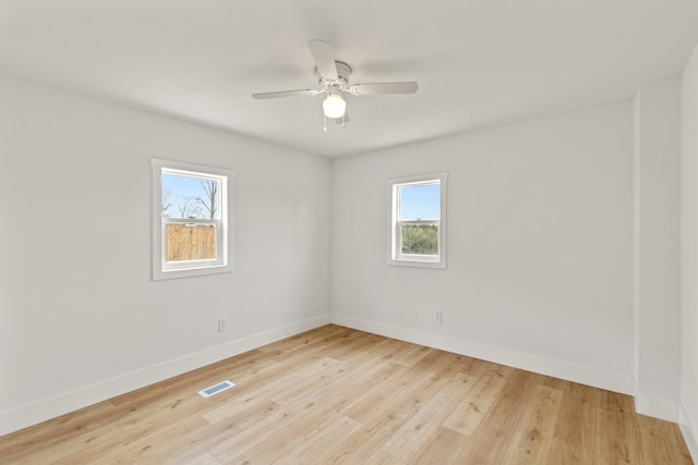 4565 155th Ave, Hersey, MI 49639 - spare room featuring healthy amount of natural light, baseboards, light wood-type flooring, and a ceiling fan