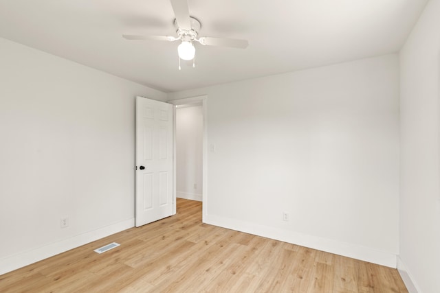 4565 155th Ave, Hersey, MI 49639 - empty room with baseboards, wood finished floors, and a ceiling fan