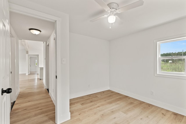 4565 155th Ave, Hersey, MI 49639 - spare room featuring light wood-type flooring, baseboards, and a ceiling fan
