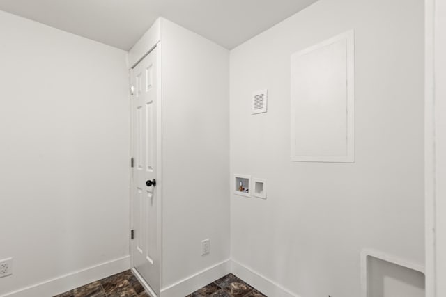 4565 155th Ave, Hersey, MI 49639 - laundry room with baseboards, washer hookup, and stone finish flooring