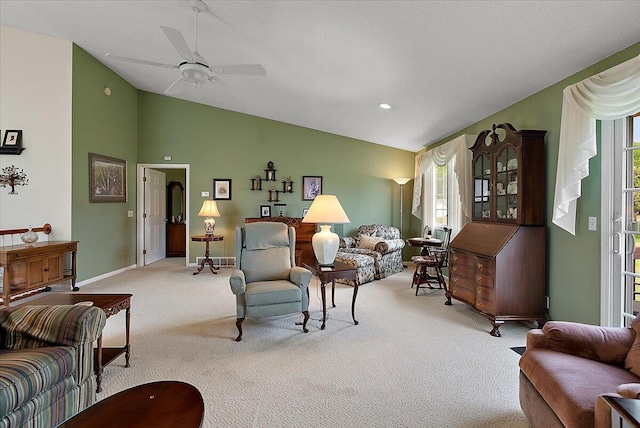3799 Fairway Dr, Norton Shores, MI 49441 - living room featuring carpet flooring, vaulted ceiling, ceiling fan, and baseboards