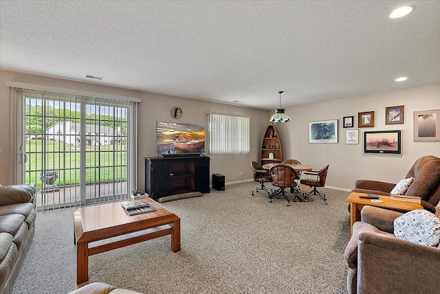 3799 Fairway Dr, Norton Shores, MI 49441 - carpeted living area with a textured ceiling, baseboards, and recessed lighting