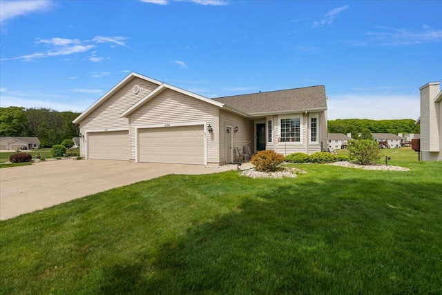 3799 Fairway Dr, Norton Shores, MI 49441 - ranch-style home with a front lawn, driveway, and a garage