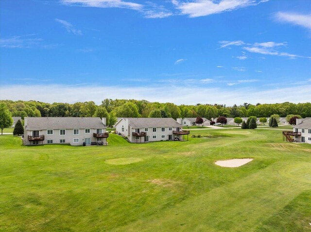 3799 Fairway Dr, Norton Shores, MI 49441 - aerial view of residential area featuring a golf course and a tree filled landscape
