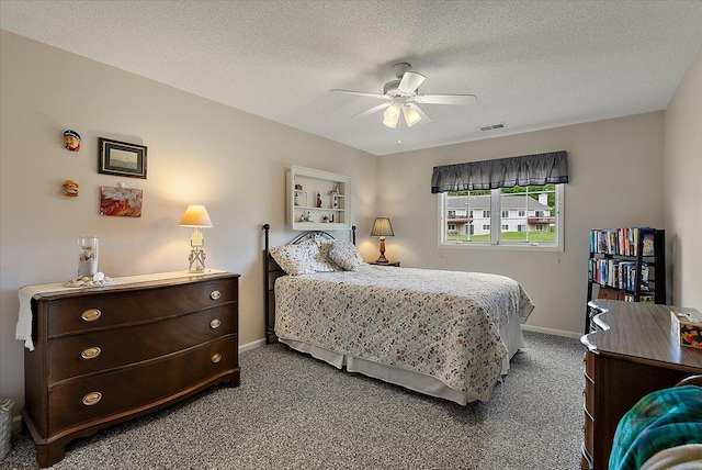 3799 Fairway Dr, Norton Shores, MI 49441 - bedroom with carpet, baseboards, a textured ceiling, and a ceiling fan
