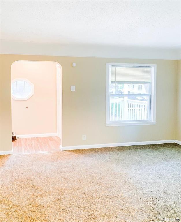 18220 Stout St, Detroit, MI 48219 - unfurnished room featuring carpet flooring, baseboards, and a textured ceiling