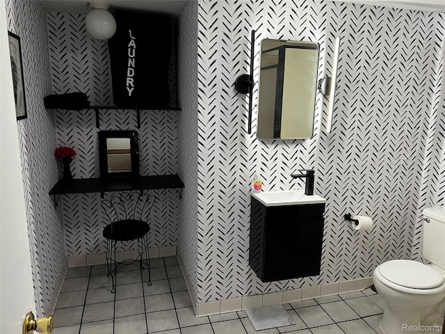 3125 Syckelmoore St, Trenton, MI 48183 - bathroom with tile patterned floors, tile walls, vanity, and toilet