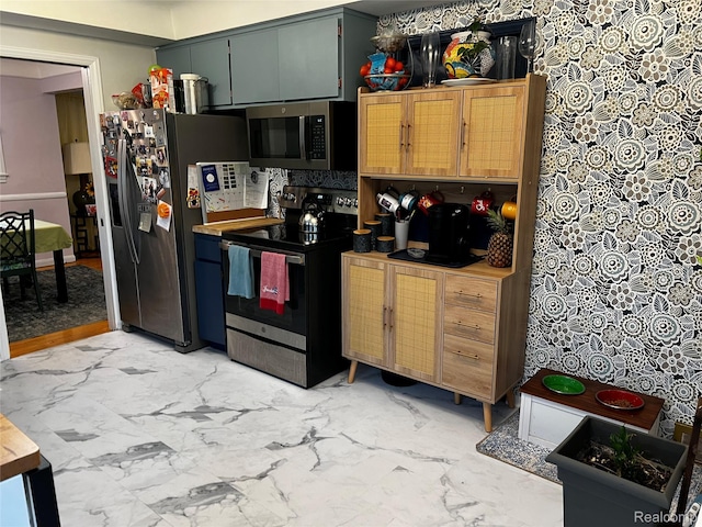 3125 Syckelmoore St, Trenton, MI 48183 - kitchen with stainless steel appliances and light marble finish flooring