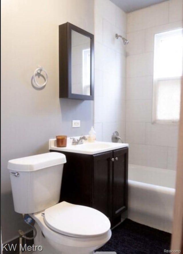15307 Biltmore St, Detroit, MI 48227 - bathroom featuring toilet, bathtub / shower combination, and vanity