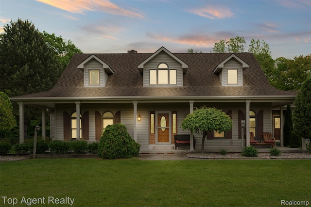 7386 Card Rd, Smiths Creek, MI 48074 - view of front of house featuring covered porch, a front lawn, a shingled roof, and a chimney