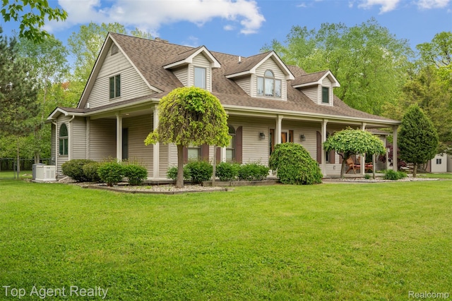 7386 Card Rd, Smiths Creek, MI 48074 - view of front facade featuring covered porch, a front lawn, and a shingled roof