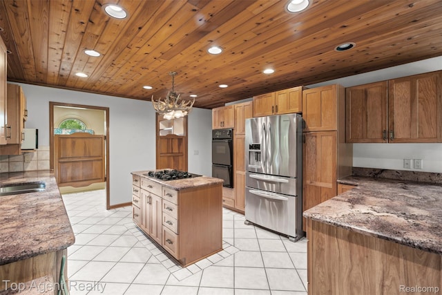 7386 Card Rd, Smiths Creek, MI 48074 - kitchen with black appliances, recessed lighting, light tile patterned flooring, a sink, and light stone counters