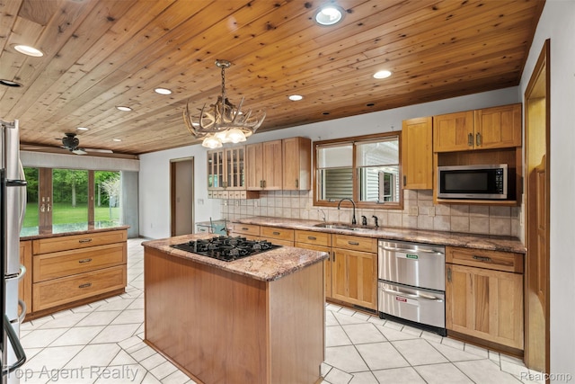7386 Card Rd, Smiths Creek, MI 48074 - kitchen featuring a sink, appliances with stainless steel finishes, light tile patterned floors, a center island, and recessed lighting