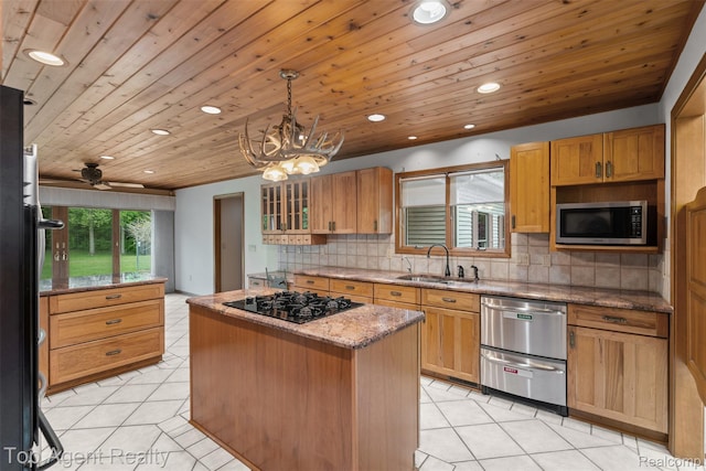 7386 Card Rd, Smiths Creek, MI 48074 - kitchen with a sink, appliances with stainless steel finishes, light tile patterned floors, a center island, and recessed lighting