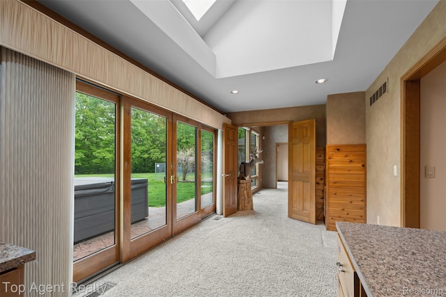 7386 Card Rd, Smiths Creek, MI 48074 - doorway featuring a skylight, light carpet, and recessed lighting