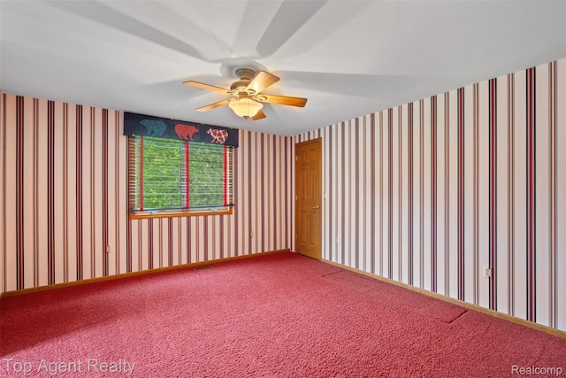 7386 Card Rd, Smiths Creek, MI 48074 - empty room with wallpapered walls, a ceiling fan, and carpet floors