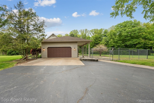 7386 Card Rd, Smiths Creek, MI 48074 - view of front facade with driveway and a garage