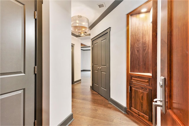 27 Library St NE Unit 301, Grand Rapids, MI 49503 - hallway with light wood finished floors and baseboards