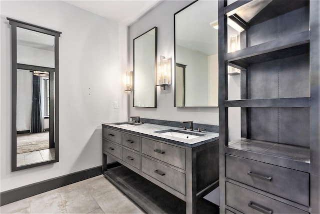 27 Library St NE Unit 301, Grand Rapids, MI 49503 - full bath with double vanity and baseboards