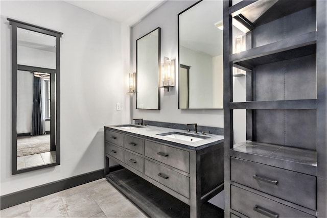 27 Library St NE Unit 301, Grand Rapids, MI 49503 - full bath with double vanity and baseboards