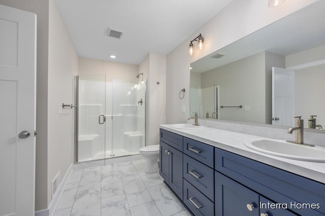3341 Kings River St SW Unit 40, Wyoming, MI 49418 - bathroom featuring marble finish floors, a shower stall, double vanity, toilet, and recessed lighting