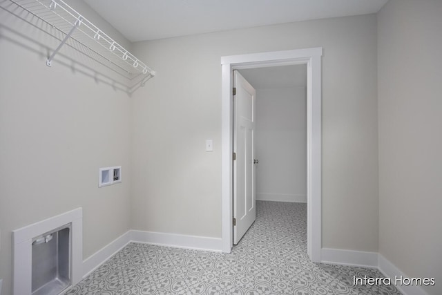 3341 Kings River St SW Unit 40, Wyoming, MI 49418 - laundry area featuring washer hookup and baseboards