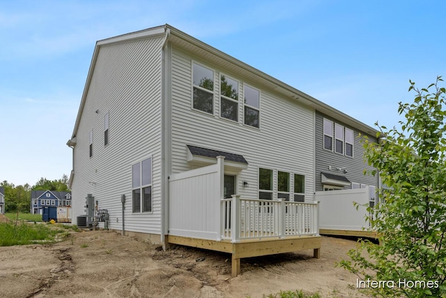 3341 Kings River St SW Unit 40, Wyoming, MI 49418 - back of house with a deck and cooling unit