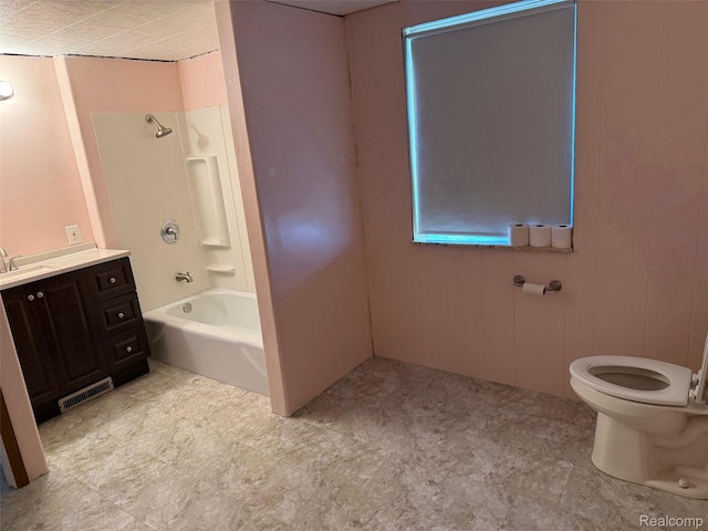 6600 Jefferson Rd, North Branch, MI 48461 - bathroom with vanity, toilet, and shower / washtub combination