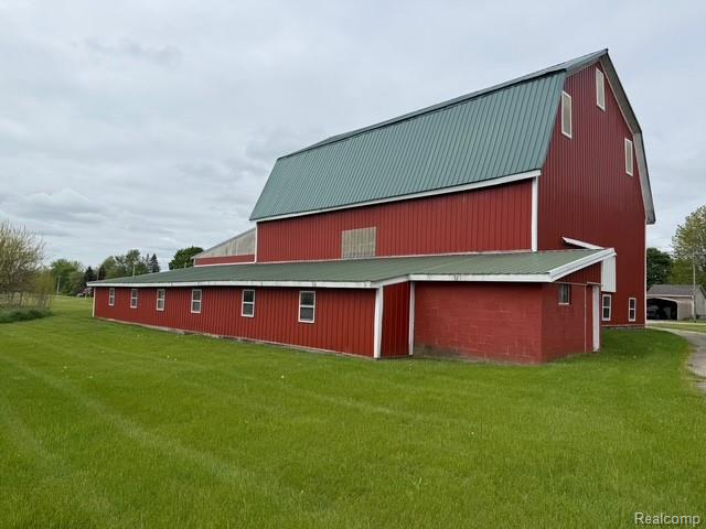6600 Jefferson Rd, North Branch, MI 48461 - view of barn featuring a yard