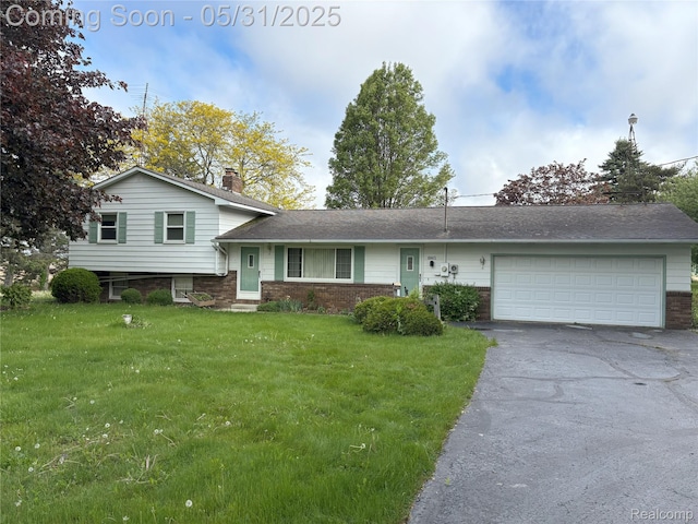 8865 E Bennington Rd, Durand, MI 48429 - split level home with brick siding, a garage, driveway, a front lawn, and a chimney