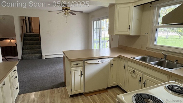 8865 E Bennington Rd, Durand, MI 48429 - kitchen featuring white appliances, a sink, a baseboard radiator, a ceiling fan, and a peninsula