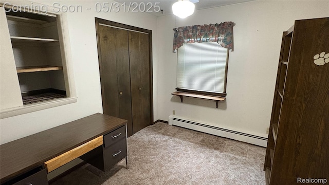 8865 E Bennington Rd, Durand, MI 48429 - unfurnished office with a baseboard heating unit and carpet flooring